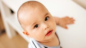 cutte-little-baby-boy-with-big-dark-eyes-and-long-2024-10-18-04-55-58-utc