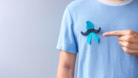 November Prostate Cancer Awareness month, Blue Ribbon with musta