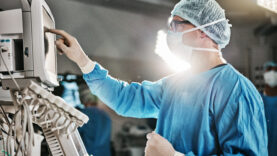 surgery-machine-and-doctor-with-monitor-in-theatr-2025-04-06-07-28-50-utc