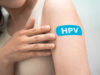 HPV, Human papillomavirus, Asian young woman receiving vaccine w
