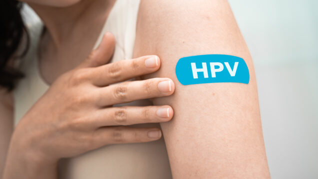 HPV, Human papillomavirus, Asian young woman receiving vaccine w